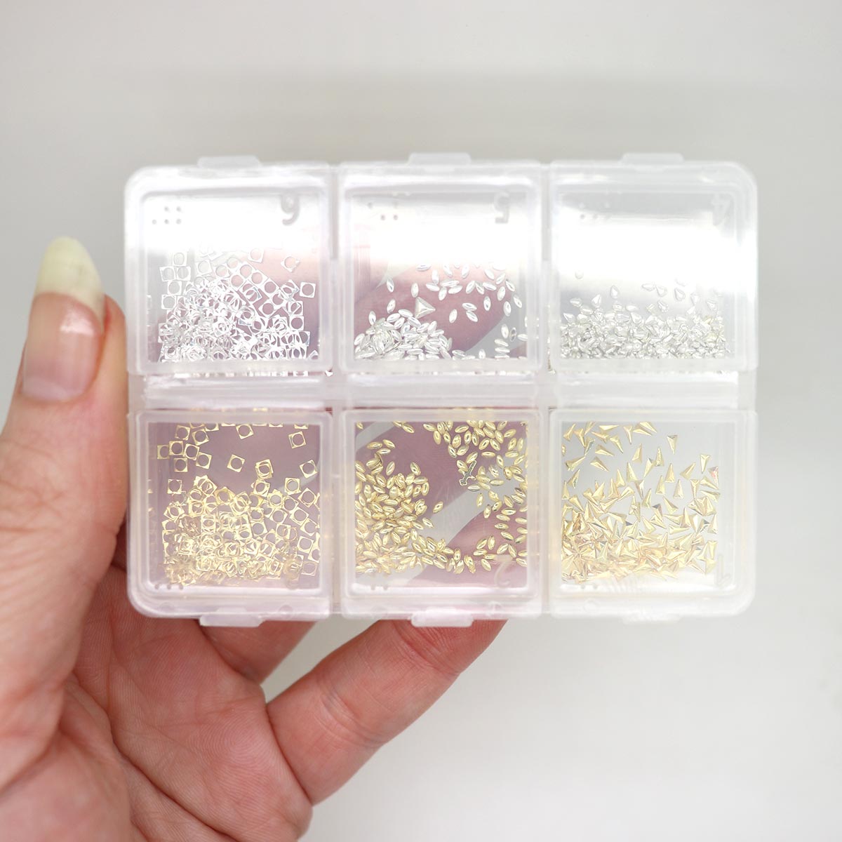 Micro silver and gold nail studs image 3