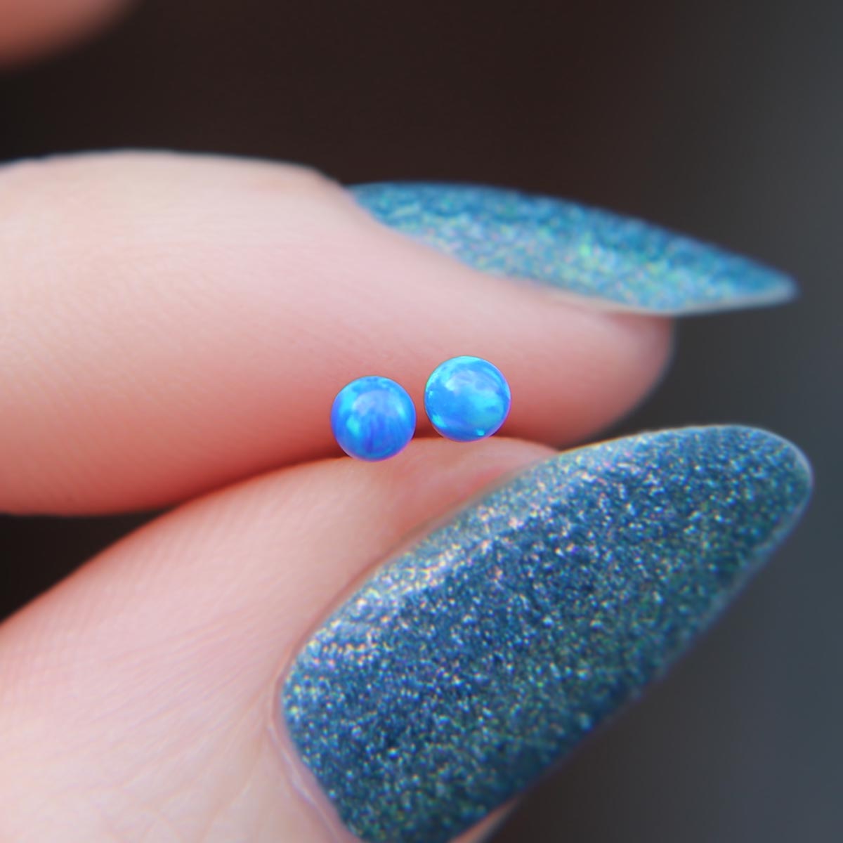 Blue Faux Fire Opal stud earrings in 925 Sterling Silver image 0